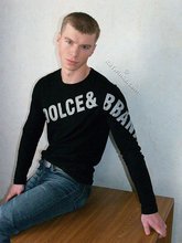 Black shirt stylish blue-eyed twink shows off his abs