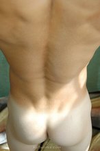 Blue-eyed and blond-haired hottie shows that ass