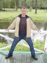 Jeans-wearing dude showing his amazing body on cam