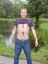 Jeans-wearing dude showing his amazing body on cam