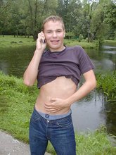 Jeans-wearing dude showing his amazing body on cam