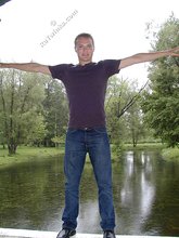 Jeans-wearing dude showing his amazing body on cam