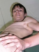 Gorgeous twink boy cums hard all over his belly