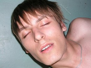 Gorgeous twink boy cums hard all over his belly