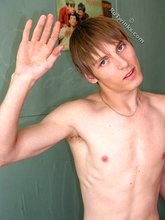 Gorgeous twink boy cums hard all over his belly