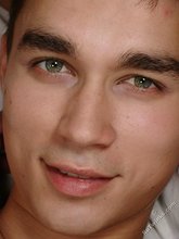 Big eyebrows brunette dude jerking off on a bed