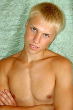 Blond-haired albino twink shows his soles and more