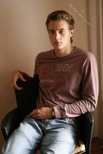 Beautiful guy takes off his sexy shirt on camera