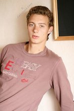 Beautiful guy takes off his sexy shirt on camera