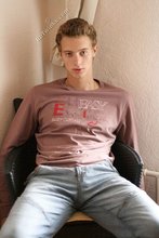 Beautiful guy takes off his sexy shirt on camera