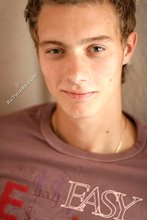 Beautiful guy takes off his sexy shirt on camera