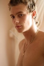 Beautiful guy takes off his sexy shirt on camera