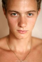 Close-ups of his face and his hairy cock