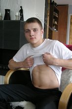 Sporty twink slowly undressing and showing his pits