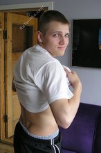 Sporty twink slowly undressing and showing his pits