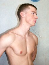 Young twink boy takes off his tiny black undies