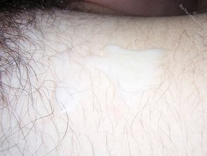 Red-faced twink squeezing out his massive load