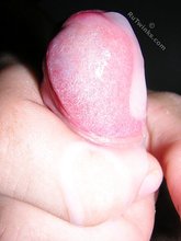 Red-faced twink squeezing out his massive load