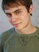 Dark-haired dude takes off his wife-beater on camera