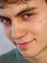 Dark-haired dude takes off his wife-beater on camera