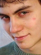 Dark-haired dude takes off his wife-beater on camera