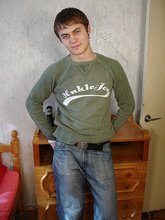 Dark-haired dude takes off his wife-beater on camera