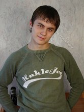 Dark-haired dude takes off his wife-beater on camera