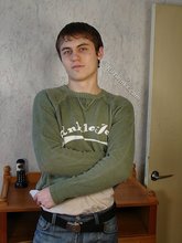 Dark-haired dude takes off his wife-beater on camera