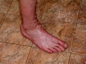 Submissive twink soaps up his boyfriend's cock