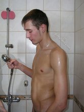 Submissive twink soaps up his boyfriend's cock