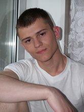 Dark-haired twink in all white decides to strip naked
