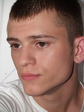 Dark-haired twink in all white decides to strip naked