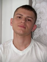 Dark-haired twink in all white decides to strip naked