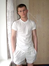 Dark-haired twink in all white decides to strip naked