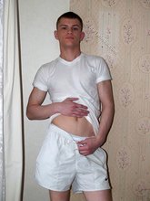 Dark-haired twink in all white decides to strip naked