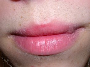 Beautiful twink shows his lips and his dick on camera