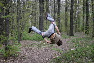 Jacked-up dude does sporty stuff and poses naked in the woods
