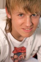 White t-shirt twink flashing his nipples on camera
