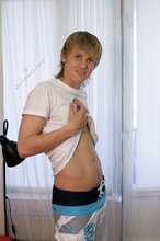 White t-shirt twink flashing his nipples on camera