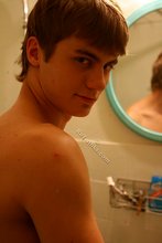 Hairy cock twink posing completely naked on camera