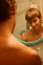 Hairy cock twink posing completely naked on camera