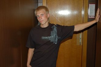 Albino-like blonde guy shows his stylish shoes