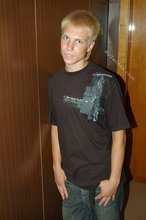 Albino-like blonde guy shows his stylish shoes