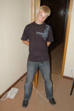 Albino-like blonde guy shows his stylish shoes