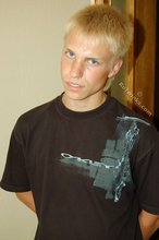 Albino-like blonde guy shows his stylish shoes