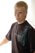 Albino-like blonde guy shows his stylish shoes