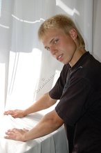Albino-like blonde guy shows his stylish shoes