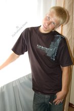 Albino-like blonde guy shows his stylish shoes