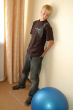 Albino-like blonde guy shows his stylish shoes