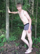 Wild forest twink posing completely naked outdoors